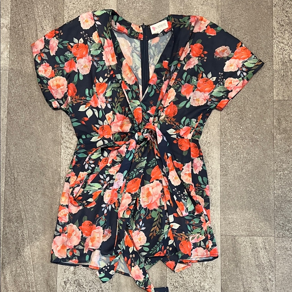 Floral navy v-neck romper with front tie